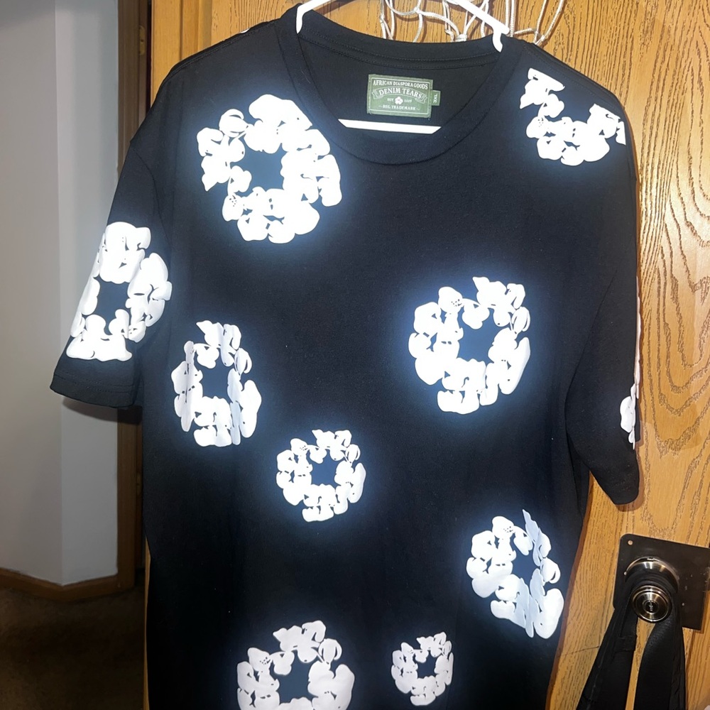 Denim Tears Black T-Shirt with White Floral Design